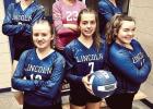 Lincoln Volleyball players celebrate Senior Nigh